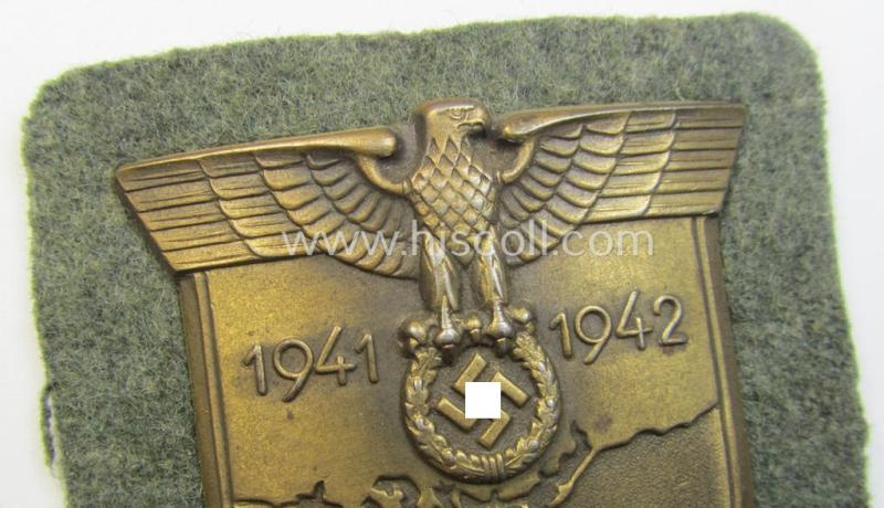 Attractive - and I deem issued but simply never used! - WH (Heeres ie. Waffen-SS) 'Krim'-campaign-shield (as was produced by a by me unidentified maker) and that comes in a wonderful and/or fully untouched, condition