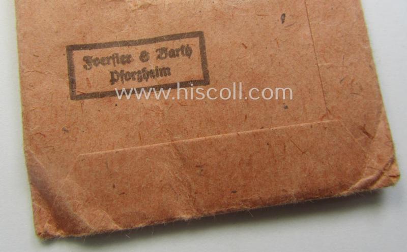 Medal-set: 'Winterschlacht im Osten 1941/42' as produced by the: 'Förster & Barth'-company being a clearly maker- (ie. '10'-marked) specimen that came stored in its original 'Zellstoff'-based pouch of issue as found