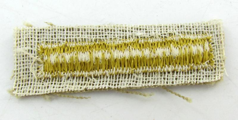 1x US WWII Overseas Service Bar on Khaki, 6 months