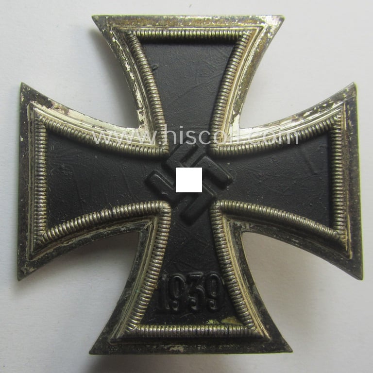 'Eisernes Kreuz 1. Klasse' (ie. Iron Cross 1st class) being an early-pattern (and clearly maker- ie. '3'-marked!) example as was produced by the: 'Wilh. Deumer'-company