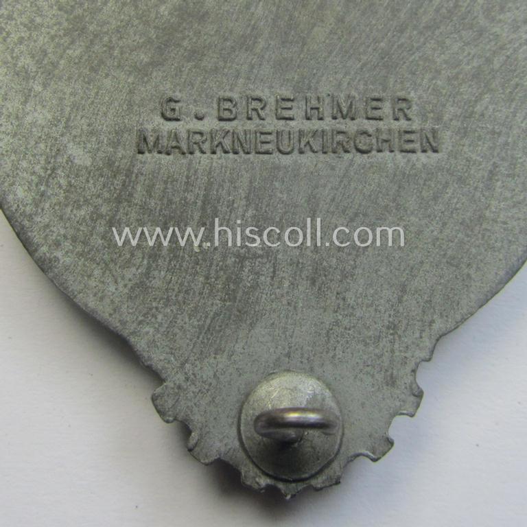 Superb - and truly scarcely encountered! - 'Feinzink'-based HJ (ie. 'Hitlerjugend') so-called: 'Reichsberufswettkampf-Siegerabzeichen' of the 2nd model, 'Gausieger 1944', being a clearly maker- (ie.: 'Gustav Brehmer'-) marked example