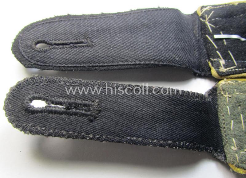 Attractive - truly worn albeit mis-matched! - pair of Waffen-SS, NCO-type shoulderstraps as piped in the bright-yellow-coloured branchcolour as was intended for usage by an: 'SS-Hauptscharführer' who served within the: 'SS Nachrichten-Truppen'