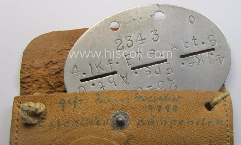 Aluminium-based, WH (Heeres-) transport (ie. 'Nachshub'-) related ID-disc, bearing the clearly stamped unit-designation: '4./Kf.Ers.Abt. 6' and that comes stored in its period- (and personalised!) pouch as issued and/or worn