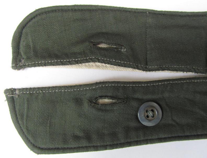 Neat, WH (Heeres, Waffen-SS etc.) greenish-coloured- and 'standard-issue'-pattern so-called: 'Kragenbinde' (or: uniform inner-collar), being a regular-issued and/or non-maker-marked example that comes in an overall nice- albeit worn- condition