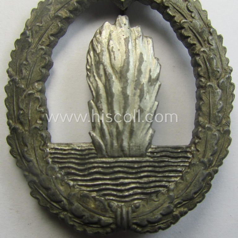 WH (KM) 'Kriegsabzeichen für Minensuch-, U-Boot-Jagd und Sicherungs-Verbände' being a typical non-maker-marked, 'Feinzink'-based example as was (I deem) produced by the: 'Adolf Scholze'-company