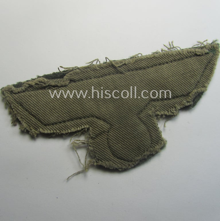 'Cut-out of a tunic' - WH (Heeres) EM- (ie. NCO-) type breasteagle (ie. 'Brustadler für Mannschaften und Unteroffiziere des Heeres')