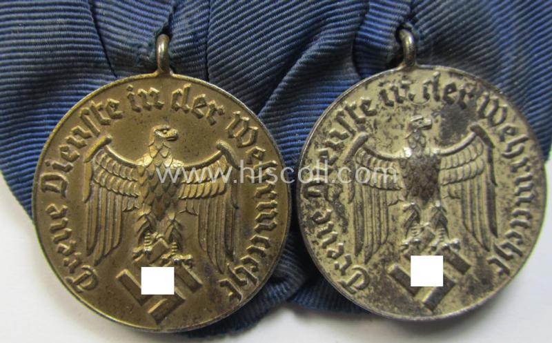 Attractive, two-pieced medal-bar (ie. 'Spange') showing two: WH (Luftwaffe) so-called: 'Dienstauszeichnungen für 4 u. 12 Jahre Treue Dienste' that both come period-mounted as a so-called: 'Doppelspange'