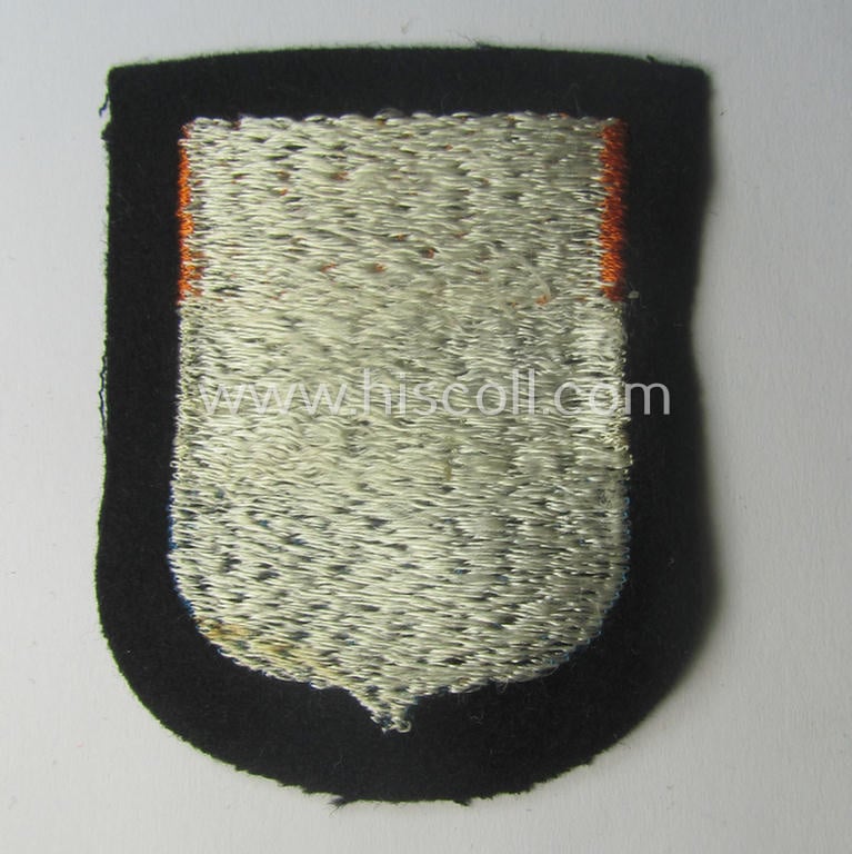 Dutch, Waffen-SS 'volunteer' arm-shield as was specifically intended for usage by soldiers of the: '23. SS Freiwilligen Panzer Grenadier Division' ('Nederland')