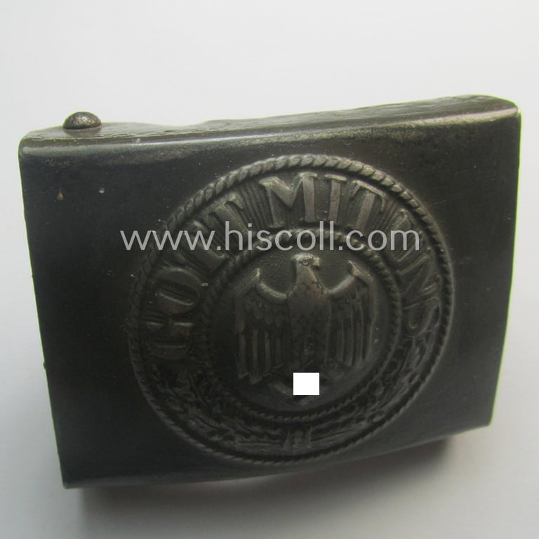 Moderately used, WH (Heeres) field-grey-coloured- and/or typical steel-based belt-buckle being a maker- (ie. 'GB') marked example