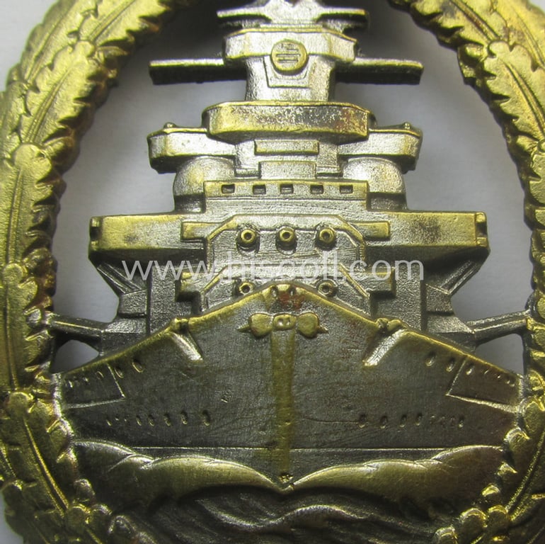 Moderately used, WH (Kriegsmarine) 'Flottenkriegsabzeichen' (or: high-sea fleet badge) being a typical 'Buntmetall'-based specimen that is neatly maker- (ie. 'Fec. Adolf Bock') marked on its back