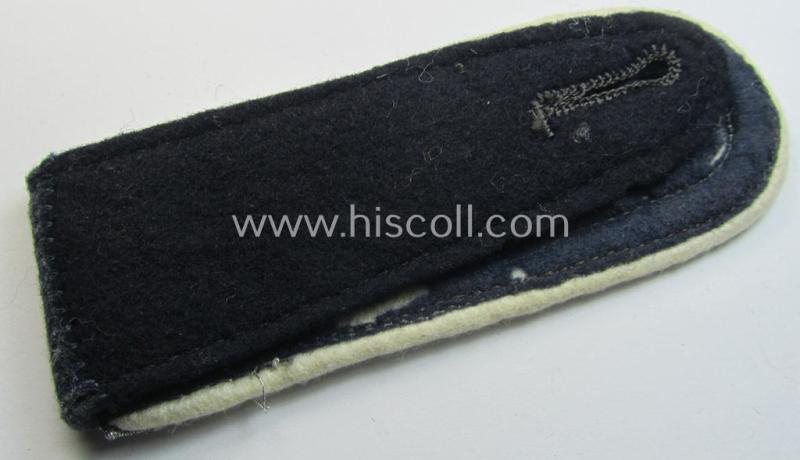 Neat - albeit regrettably single! - WH (Luftwaffe) NCO-type shoulderstrap as piped in the desirable white-coloured branchcolour as was intended for - and with certainty used by! - an: 'Unteroffizier der Hermann Göring-Division'