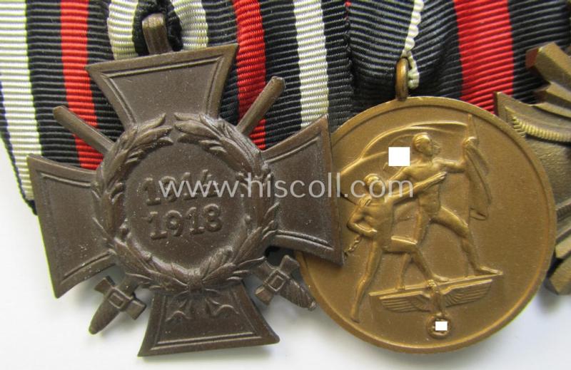 Superb, 3-pieced N.S.D.A.P.-related medal-bar (ie. 'Ordenspange') showing resp. an: 'FKK 1914-18 mit Schw.', a: Czech 'Anschluss' medal and a: 'N.S.D.A.P.-DA. in Bronze' (ie. '3. St. für 10 Jahre t. D.')