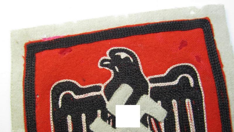 Attractive example of a neatly embroidered NSRL- (ie. 'NS Reichsbund für Leibesübungen'-related sports'-tunic-patch as was specifically intended for usage on the various shirts and/or tunics during the Berlin Olympic Games held in 1936