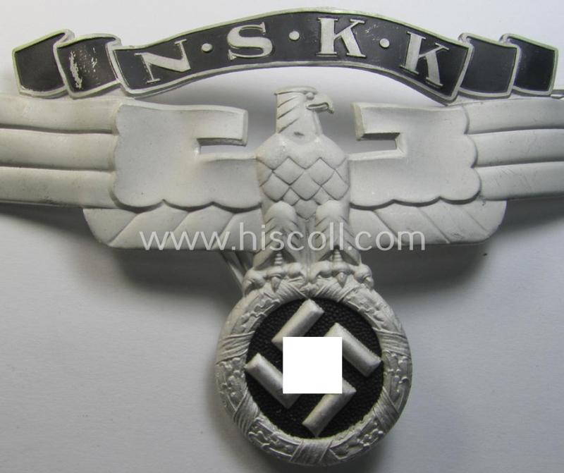 Aluminium-based so-called: N.S.K.K. (or: 'National Socialistisches Kraftfahr Korps') crash-helmet eagle-device (ie. 'Adler für N.S.K.K.-Sturzhelm') being a neatly maker- (ie. 'RzM M1/8'-) marked example of the second pattern