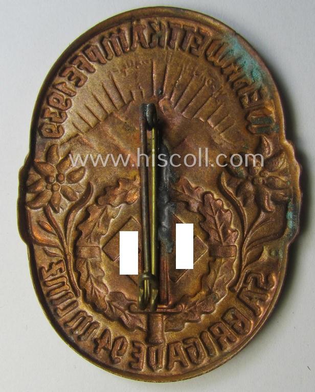 Commemorative, reddish-bronze-toned and Austrian-related, SA- (ie. 'Sturmabteilungen'-) related 'tinnie' being a non-maker-marked example showing an: 'SA-Sportabzeichen', sunburst and text: 'Wettkämpfe 1939 - SA-Brigade 94 in Linz'