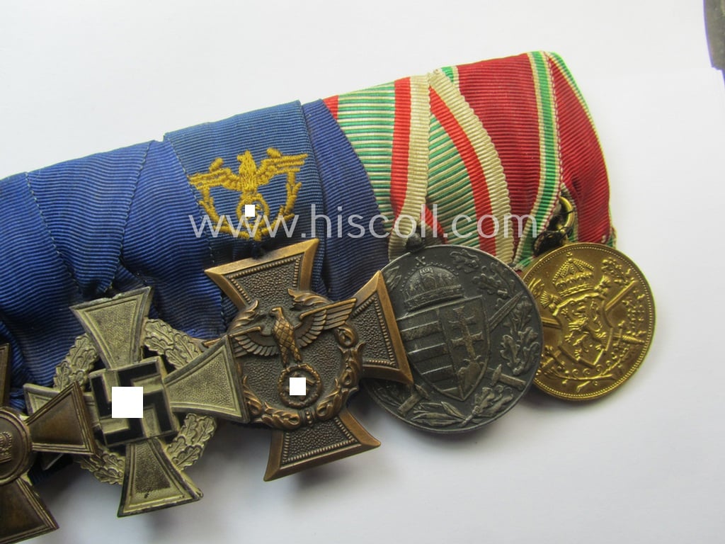 Superb, 8-pieced WWI- (ie. TR-) related medal-bar (ie. 'Ordenspange') depicting an: 'EKII.Kl., an: 'Hanseatenkreuz 1914', an: 'FKK 1914-18 mit S.', a: 'TD-Ez. der 2. Kl.', a: 'Zollgrenzschütz-Ez.' and two Austrian WWI-period comm. medals