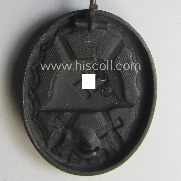 Neatly maker- (ie. 'L/56'-) marked example of a black-class wound-badge (or: 'Verwundeten-Abzeichen in Schwarz') being an example that was produced by the maker (ie. 'Hersteller') named: 'Funcke & Brüninghaus'