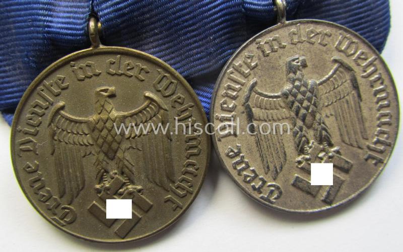 Attractive, two-pieced medal-bar (ie. 'Spange') showing two: WH (Heeres o. Kriegsmarine) so-called: 'Dienstauszeichnungen für 4 u. 12 Jahre Treue Dienste' that both come period-mounted as a so-called: 'Doppelspange'