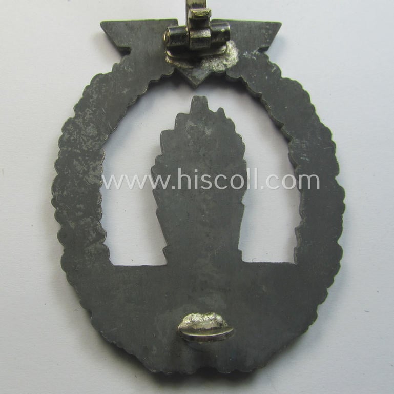 WH (Kriegsmarine) 'Kriegsabzeichen für Minensuch-, U-Boot-Jagd und Sicherungs-Verbände' being a detailed albeit non-maker-marked and 'Feinzink'-based example as was produced by the: 'Förster & Barth'-company