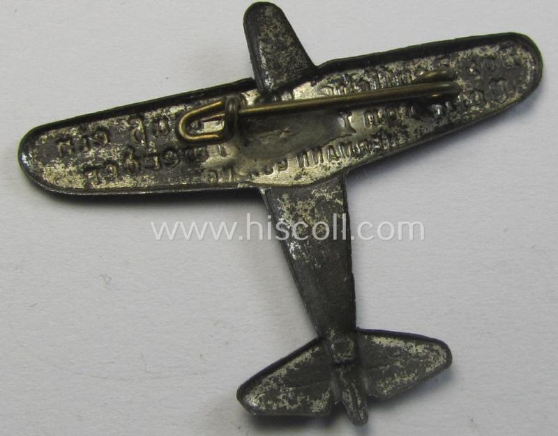 Commemorative, greyish-toned so-called: 'Flieger'- (ie. 'WHW'-) related day-badge (ie. 'tinnie') being a non-maker-marked example showing the text: 'Das Deutsche Volk muss ein Volk von Fliegern werden - Herrmann Göring'