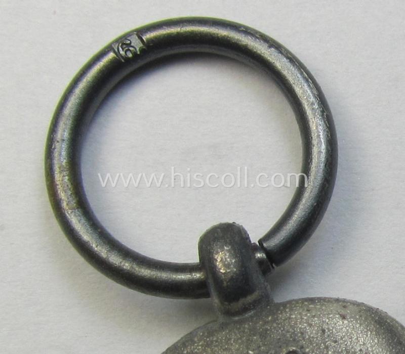 Attractive medal-set: 'Winterschlacht im Osten 1941-42' being a maker- (ie. '6.'-) marked- (and/or 'Feinzink'-based) specimen by the maker: 'Fritz Zimmermann' and that comes together with its (minimally confectioned) ribbon (ie. 'Bandabschni...