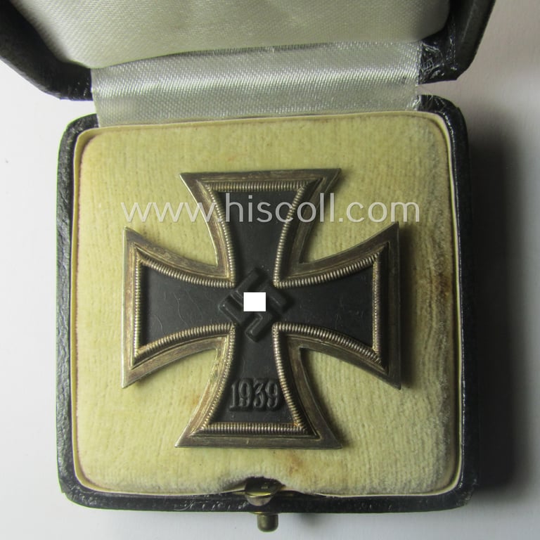 'Eisernes Kreuz 1. Kl.' (or: Iron Cross 1st class) being a (typical) maker- (ie. 'L/13'-) marked example as was produced by the maker (ie. 'Hersteller'): 'Paul Meybauer' and that comes in its original etui as issued