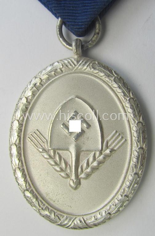 RAD (ie. 'Reichsarbeitsdienst') so-called: 'Dienstauszeichnung 3. Stufe für Männer' (as was intended for 12 years loyal-service) and that came mounted onto its period piece of ribbon (ie. 'Bandabschnitt')