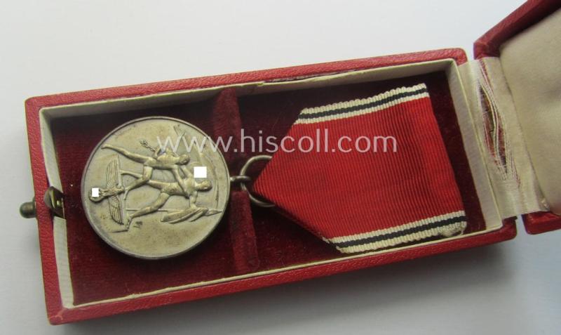 WH Austrian-occupation- (ie. 'Anschluss'-) medal: '13. März 1938' being a very attractive (and hardly tarnished) example that comes stored in its bright-red-coloured- and/or typical non-maker-marked etui as issued