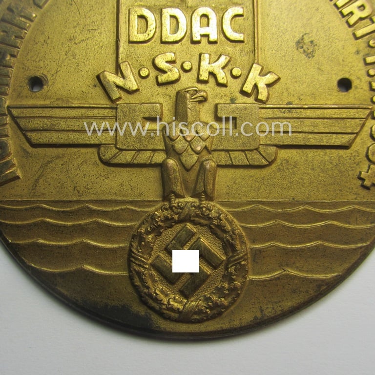 Commemorative, N.S.K.K.-/D.D.A.C.-related car-plaque (ie. 'Erinnerungs- o. nichttragbare Kfz-plakette') showing both N.S.K.K.-/D.D.A.C.-logo's and text: 'Nordmark Zuverlässigkeitsfahrt - 1.7.1934'