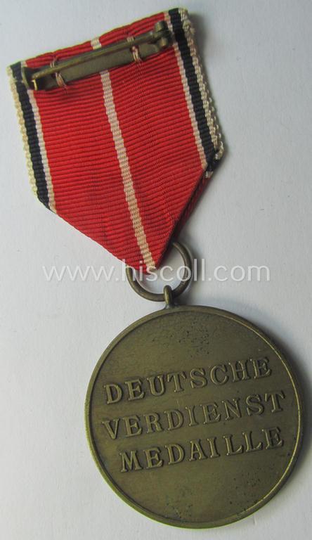 'Deutsche Bronzene Verdienstmedaille des Deutschen Adler Ordens ohne Schwn.' being a '30'-marked example