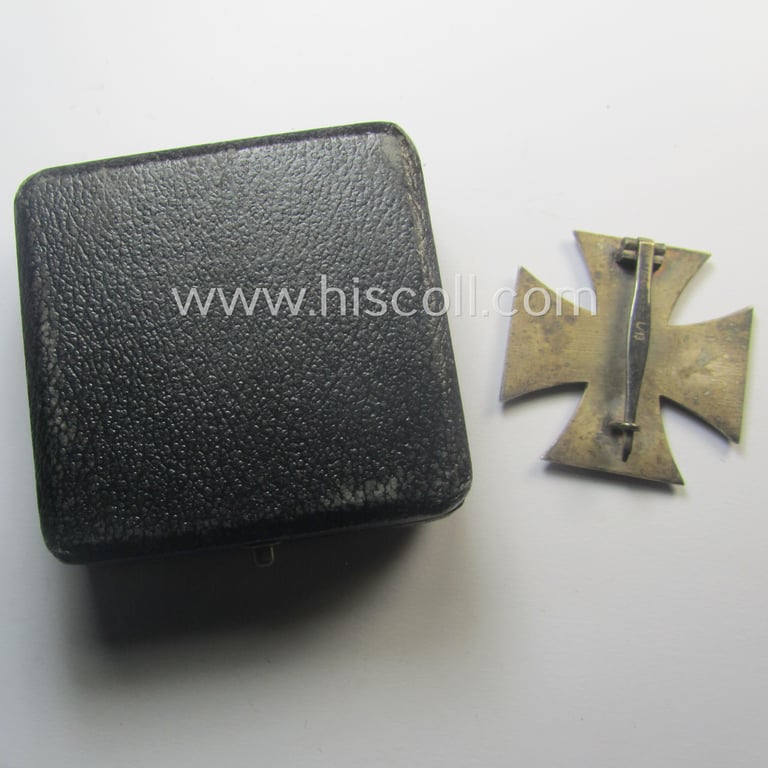 'Eisernes Kreuz 1. Kl.' (or: Iron Cross 1st class) being a (typical) maker- (ie. 'L/13'-) marked example as was produced by the maker (ie. 'Hersteller'): 'Paul Meybauer' and that comes in its original etui as issued