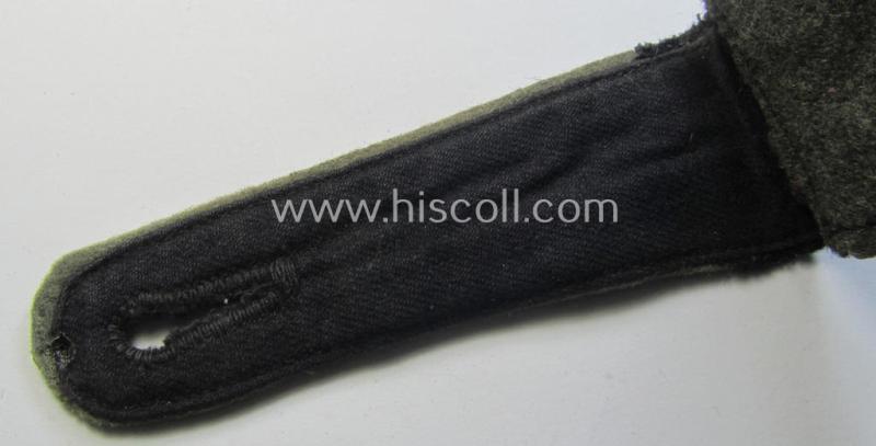 Attractive - albeit regrettably single! - Waffen-SS, EM-type shoulderstrap as piped in the white-coloured branchcolour as was intended for usage by an: 'SS-Mann' who served within the: 'SS-Infanterie-Truppen'