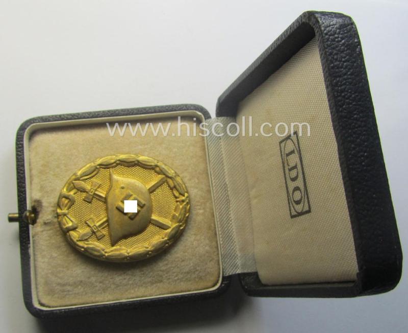 Rarely encountered 'Verwundeten-Abzeichen in Gold' being a clearly maker- (ie. 'L/11'- by 'Wilh. Deumer') marked- and typical 'Buntmetall'-based example that comes stored in its period- (and LDO-marked!) etui