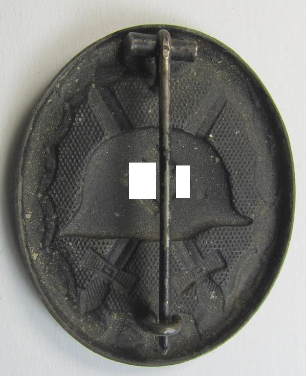 Non-maker-marked example of a black-class wound-badge (or: 'Verwundeten-Abzeichen in Schwarz') that comes in an overall nice- (ie. moderately used- ie. worn-), condition