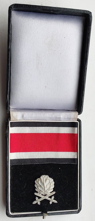 A cased LDO Oak leaves and swords to the Knights Cross