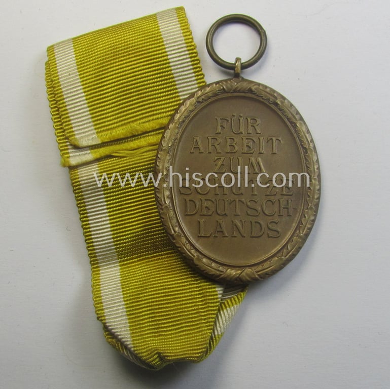Medal-set: 'Deutsches Schutzwall Ehrenzeichen' (aka: 'Westwall'-medal) being a non-maker-marked- and/or: 'Buntmetall'-based specimen