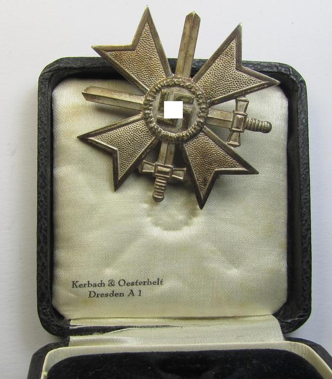 Attractive medal-set: 'Kriegsverdienstkreuz 1. Klasse mit Schwerter' being a non-maker-marked (and 'Buntmetall'-based!) specimen that comes stored in its original, luxuriously-styled KvK-etui by the maker: (ie. 'Hersteller') 'Kerbach & Oesterh...