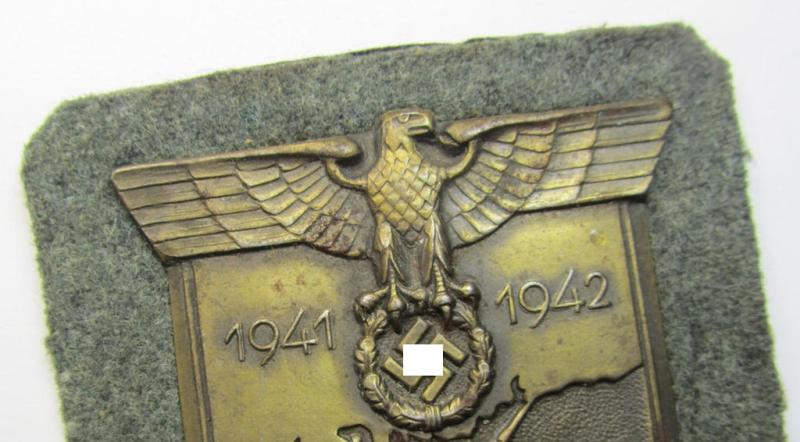 Attractive - albeit minimally rust-stained - WH (Heeres ie. Waffen-SS) 'Krim'-campaign-shield (as was produced by a by me unidentified maker) and that comes in a presumably issued - albeit 'virtually mint', condition