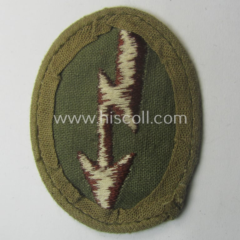 WH (Heeres) 'tropical-styled', trade- and/or special-career insignia (or: 'Signal Blitz') as was intended for a soldier who served within the: 'Kradschützenbtle. der Pz. Div. u. Inf. Divisione (mot.)'