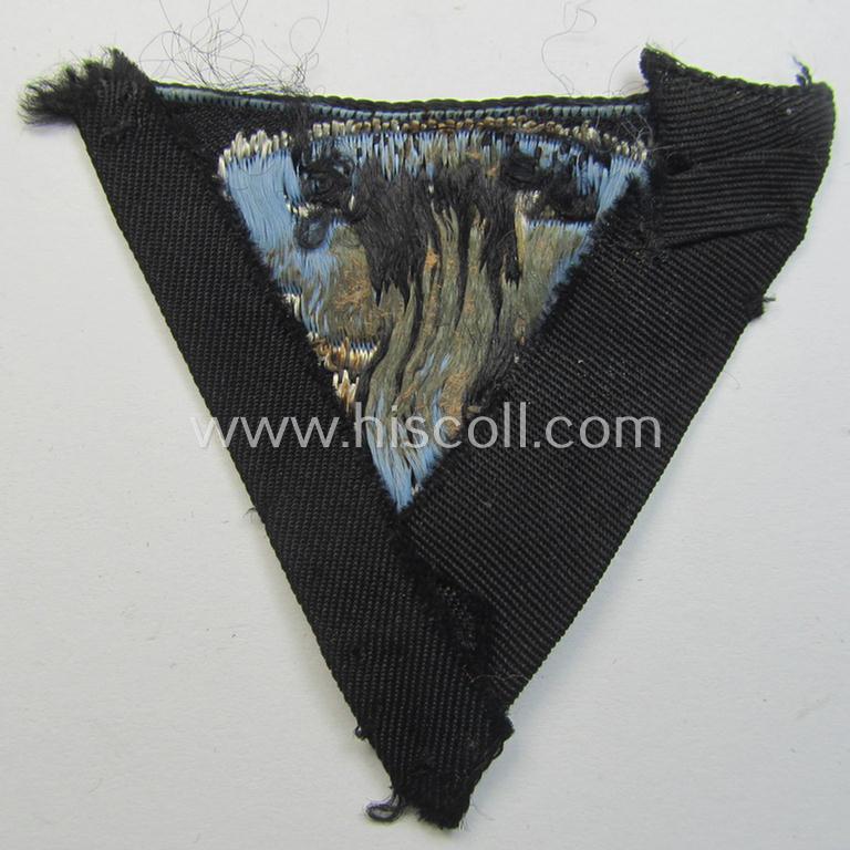 Attractive, so-called: N.S.K.K. (ie. 'National Socialistisches Kraftfahr Korps') side-cap-eagle (ie. 'Adler für N.S.K.K.-Schiffchen o. Lagermütze') being a 'flat-wire-woven'-example onto a bright-blue-coloured background