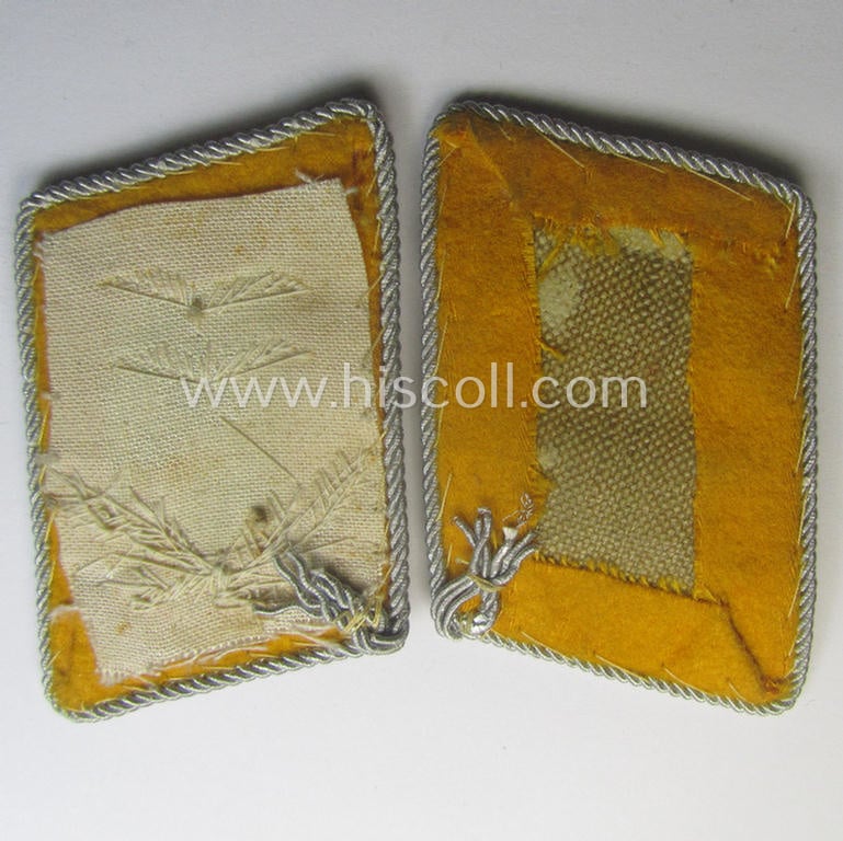 Pair of WH (LW) officers'-type collar-patches (ie. 'Kragenspiegel') as executed in golden-yellow-coloured wool as was intended for usage by an: 'Oberleutnant der Flieger-o. Fallschirmjäger-Trpn.'