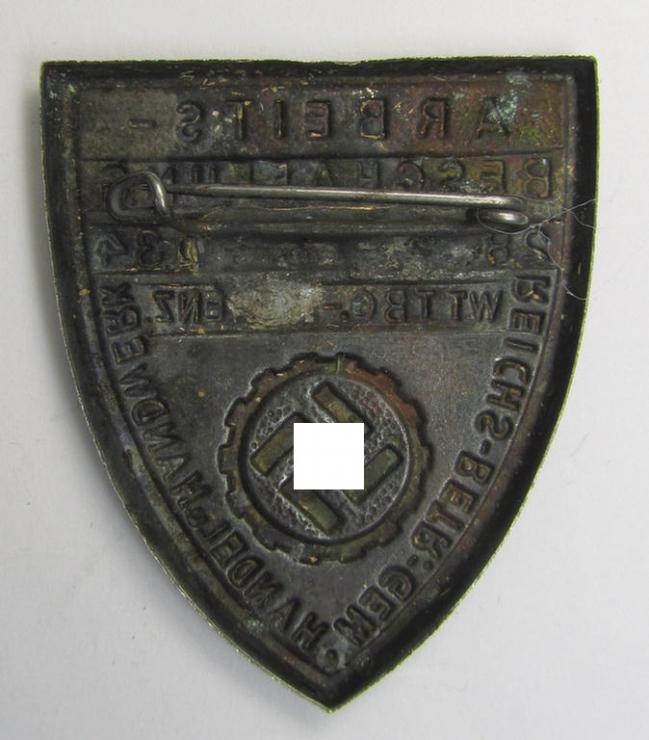 Silver-toned- (and/or tin-based) RAD- (ie. 'Reichsarbeitsdienst'-) related day-badge depicting a so-called: 'RAD-Zahnrad' and text: 'Arbeitsbeschaffung - 28.9.-14.10.1934 - Wttbg. Hohenz.' and sub-titled: 'Reichs-Betr. Gem. - Handel u. Handwer...