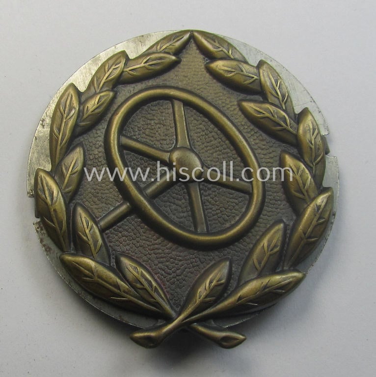 WH (Heeres, LW ie. Waffen-SS-) so-called: 'Kraftfahrbewährungs-Abzeichen in Bronze' being a 'virtually mint' example as was produced by the maker: 'Friedrich Orth - Wien IV/56' (ie. 'L/14') and that came stored in its 'Zellstoff'-based pouch