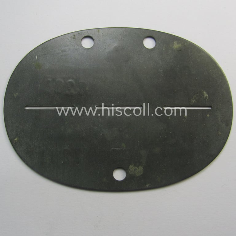 'DRK' (ie. 'Deutsches Rotes Kreuz') and (European) volunteer-related, zinc-based ID-disc bearing the engraved unit-designation: 'Freiwillige Krankenpflege - Wehrkreis XVII - No. 7281'