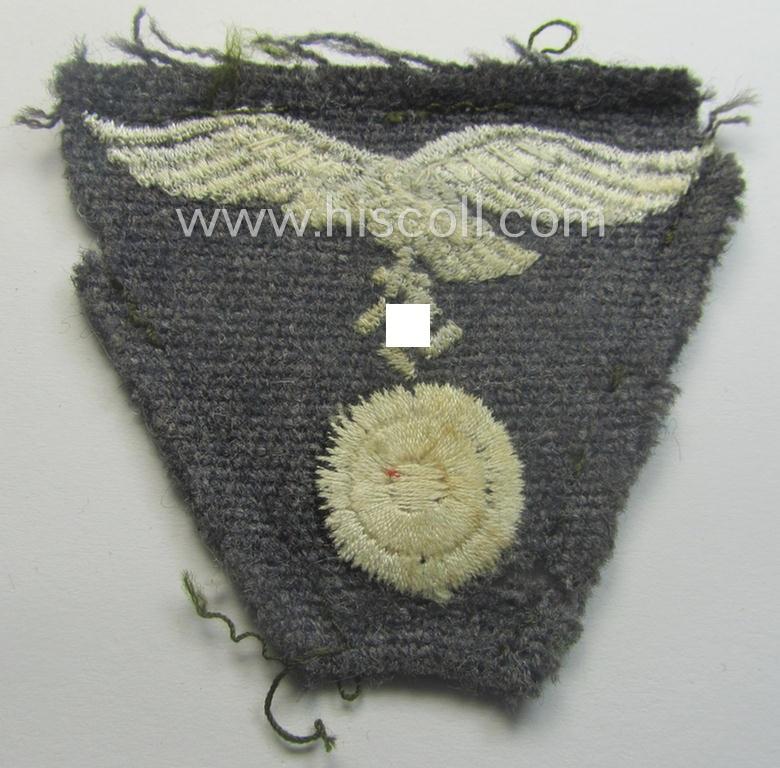Clearly cap-removed, WH (Luftwaffe) so-called: 'M43-pattern'-cap-trapezoid (ie. 'Mützentrapez')