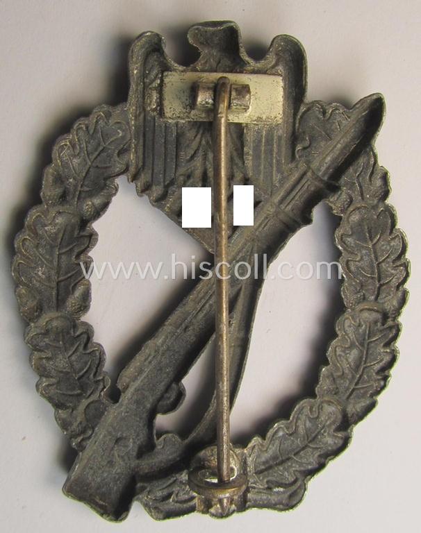 Attractive, 'hollow-back'-pattern 'Infanterie Sturmabzeichen in Silber' (or: silver infantry-assault badge ie. IAB) being a non-maker-marked example as executed in zinc-based metal (ie. 'Feinzink') as was produced by the: 'Wilh. Deumer'-compa...