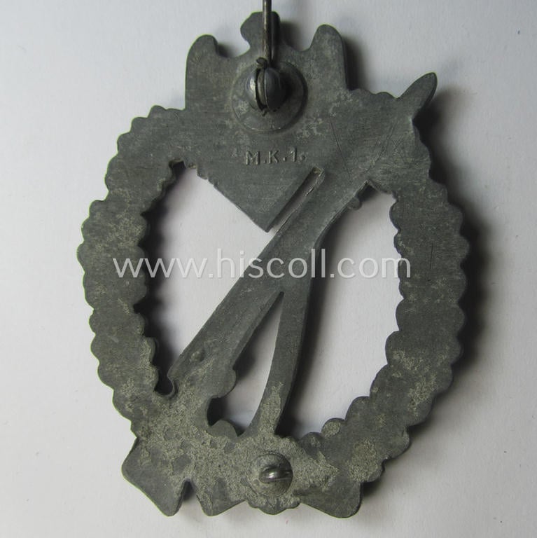 'Infanterie-Sturmabzeichen in Silber' (or: silver-class infantry-assault badge ie. IAB) being a neatly maker- (ie. 'MK 1'- or: 'Metall u. Kunststoff'-) marked example as executed in greyish-silverish-coloured 'Feinzink'