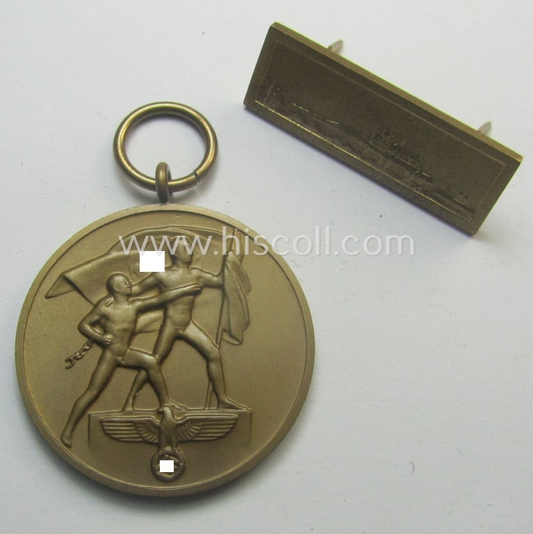 WH Czech-occupation- (ie. 'Anschluss'-) medal: '1. Oktober 1938' that comes with its accompaning 'PB-Spange' and that comes stored in its period pouch by the maker: 'Eugen Schmidhäussler - Pforzheim'
