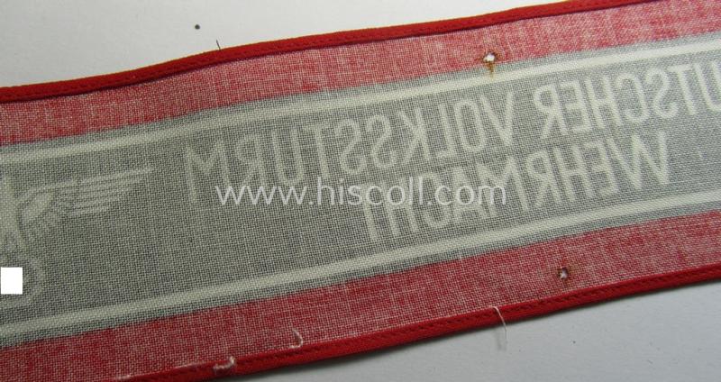 Superb, typically printed- and/or later-war-period, bright-red- and/or black-coloured so-called: 'Deutscher Volkssturm'-armband (ie. 'Armbinde') that comes in an overall very nice- (I deem hardly used- nor worn- ie. 'virtually mint'-), conditio...