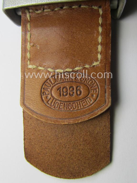 'Reichsarbeitsdienst'- (ie. RAD-) EM- (ie. NCO-) type belt-buckle being a maker- (ie. 'Paulmann & Crone'-) marked example which is dated: '1936' and that comes mounted onto its leather-based tab
